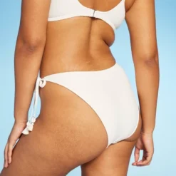 Women's Crochet Side-Tie Extra Cheeky Extra High Waist Bikini Bottom - Wild Fable™ Cream 8 Women's Crochet Side-Tie Extra Cheeky Extra High Waist Bikini Bottom - Wild Fable™ Cream -Wild Fable Store GUEST 27343605 56a4 4f72 99fb 7000c782fd95
