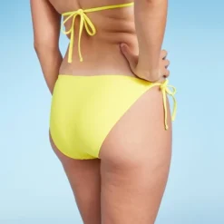 Women's Side-Tie Cheeky Bikini Bottom - Wild Fable™ Yellow 10 Women's Side-Tie Cheeky Bikini Bottom - Wild Fable™ Yellow -Wild Fable Store GUEST d60575f0 7377 464a 8b1f bea4ae4f1fb7