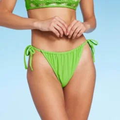 Women's Low-Rise Side-Tie Cheeky Bikini Bottom - Wild Fable™ -Wild Fable Store GUEST fb45f3d8 0545 4021 95ce 6cc80b70ceec